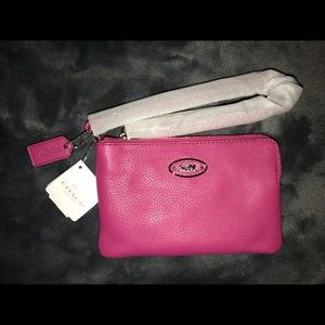 COACH pebble leather fuchsia wristlet
